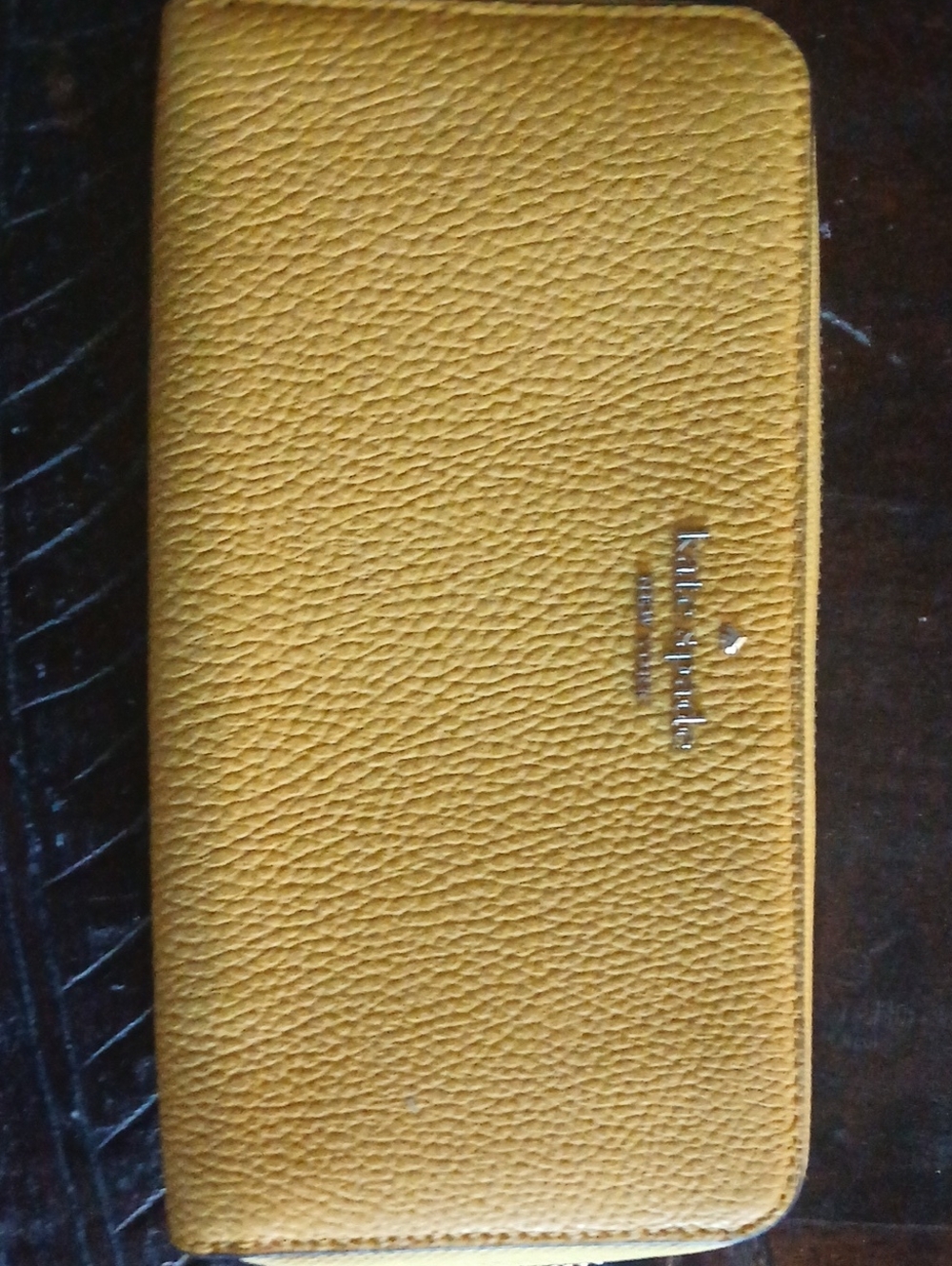 kate spade Pebbled Leather Phone Wallet in Mustard